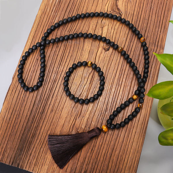 Set di braccialetti e collane con perline fatti a mano