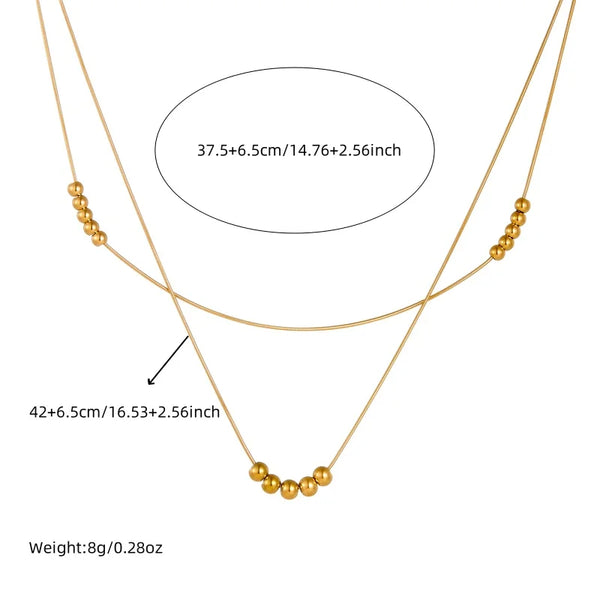 Collana con bracciale a doppio strato in acciaio inossidabile 316L con perline rotonde dorate, adatta per donna, nuova tendenza 2024, set di gioielli resistenti alla luce